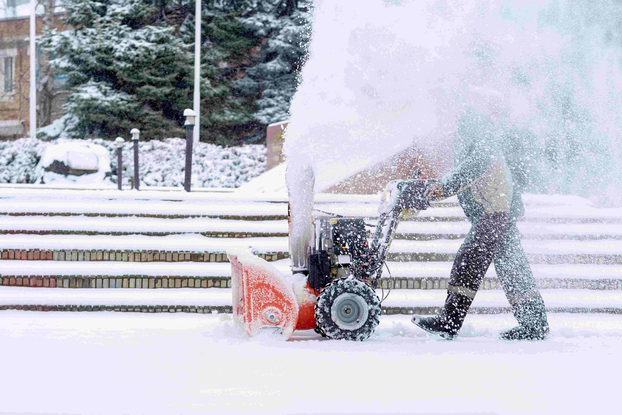 Snow Blowing Titans: Men's Domination Over Winter's Wrath