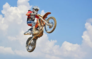 Title: The Roar of Adventure: Men Conquering the Motocross Terrain