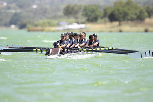 Rowing: Men Glide Across the Waters of Endurance