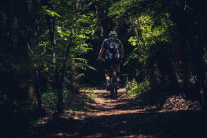 Men on Wheels: Conquering Trails Through Mountain Biking